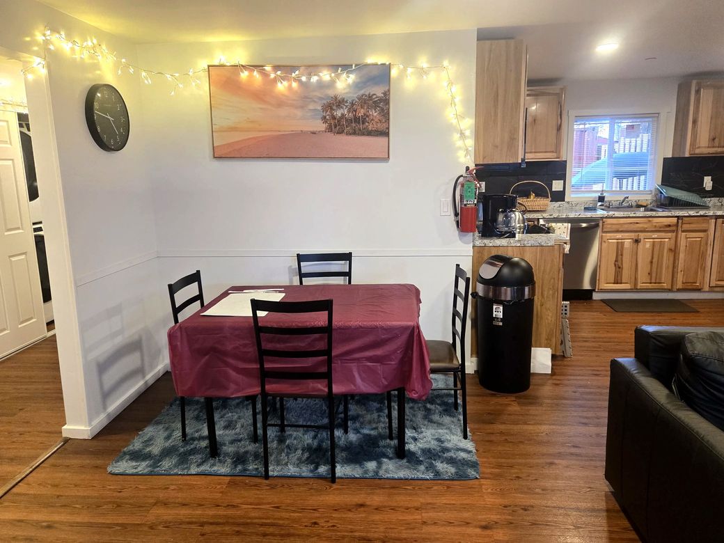 Dining area with seating, open to the kitchen